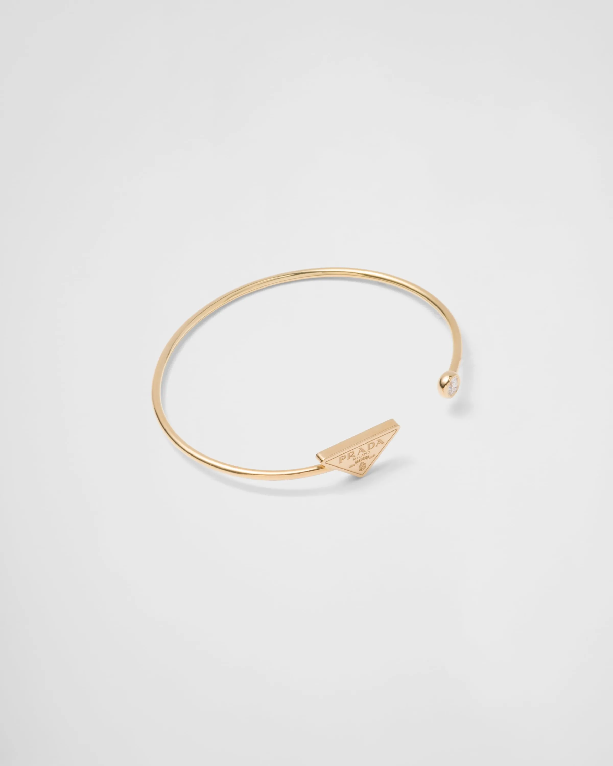 Prada Bracciale rigido Eternal Gold in oro giallo con diamante